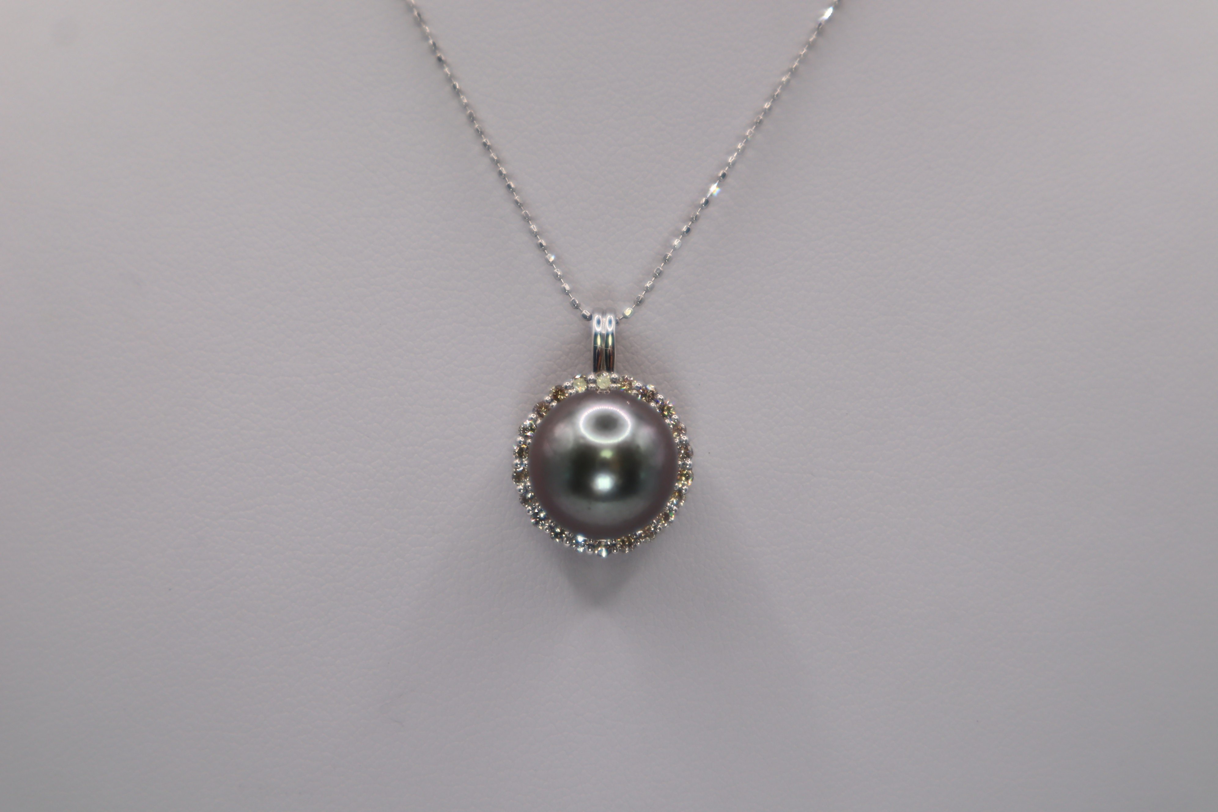 
            1958 【真珠科学研究所オーシャンブルーソーティング付】【テリ最強】K18WG タヒチ黒蝶真珠11.0㎜up　ダイヤモンド0.45ctペンダントネックレス
          