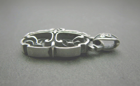 Oval cross pendant