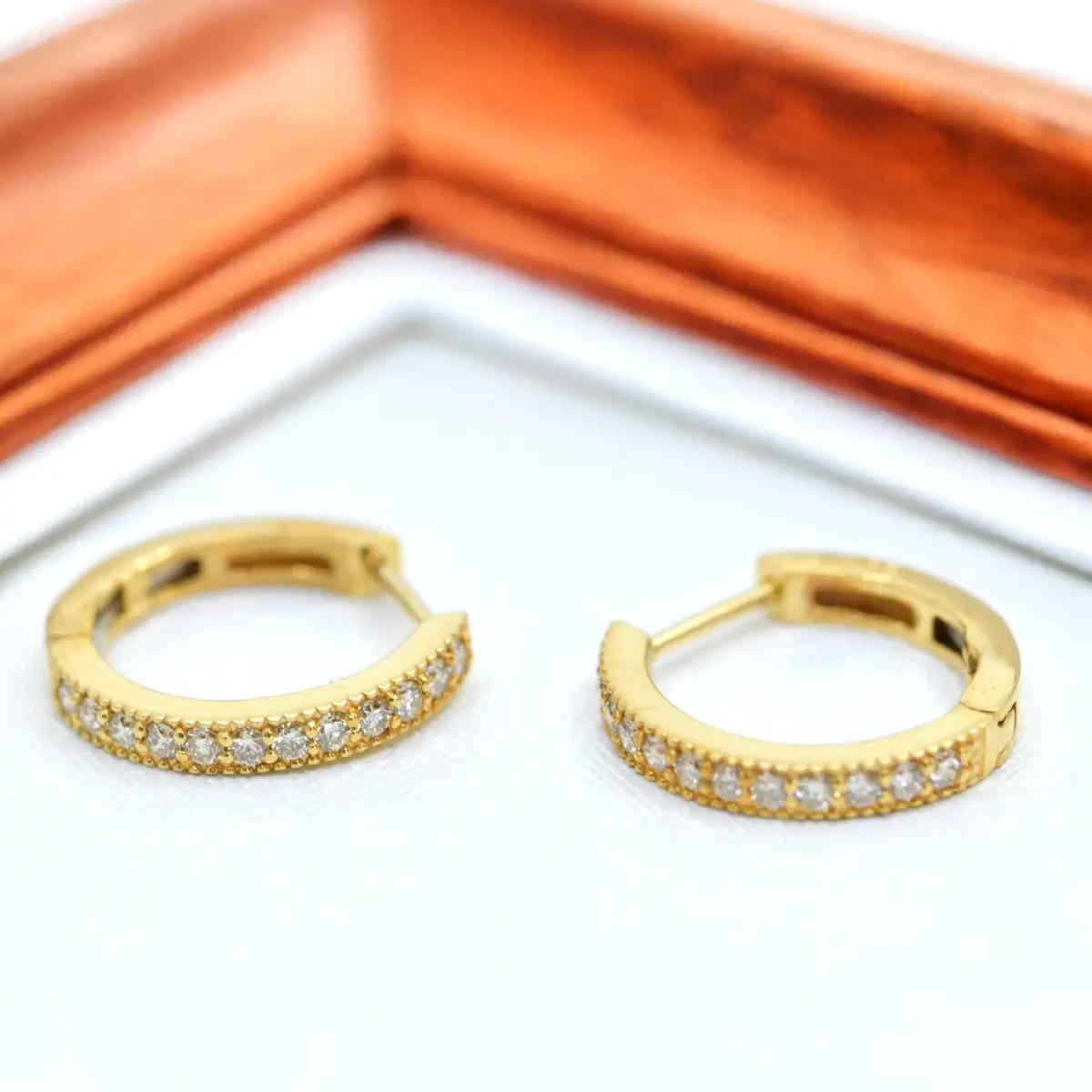 K18ダイヤハーフエタニティミル打ち中折れバネ式ピアス0.3ct　A4727 260-007