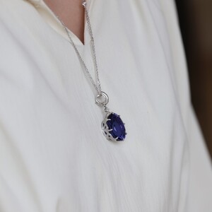 タンザナイト（32.27ct）ダイヤモンドプラチナペンダント　IS2　K06042-H
