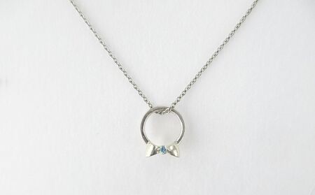 ジュエリームナカタ　【11月 トパーズ】 ベビーリング　～HARUHI～（ハート＆リボン）　シルバー製／チェーンなし【11100-2321】