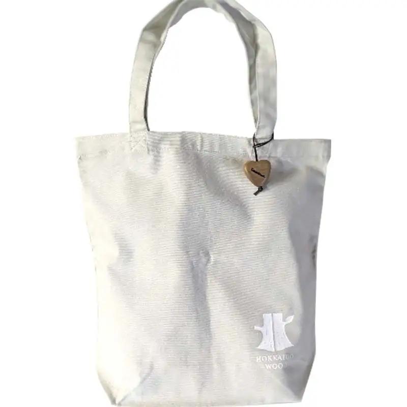 【ＫＥＭ】touchWood 「マスコットファスナー」（ホウ（紐色・焦茶）） HOKKAIDO WOOD 木製 マスコツトファスナー 自然 目印 プレゼント F6S-450