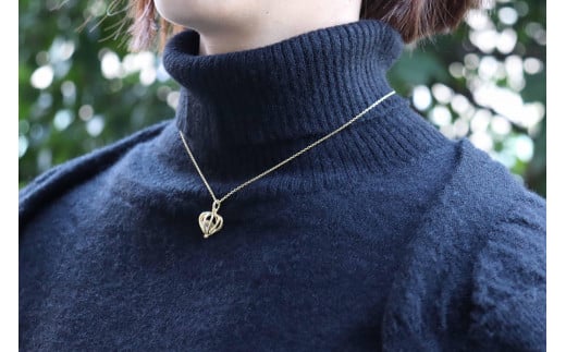 【プレゼント包装付き】シルバーのカゴペンダント（金色 /白水晶）