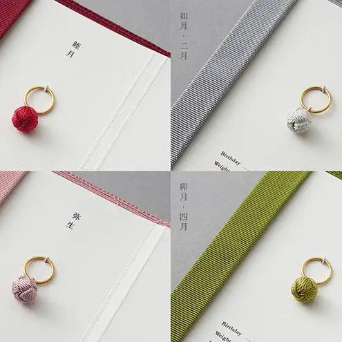 縁起の良いベビーリングと綴織カバー＜命名指輪＞ 一月
