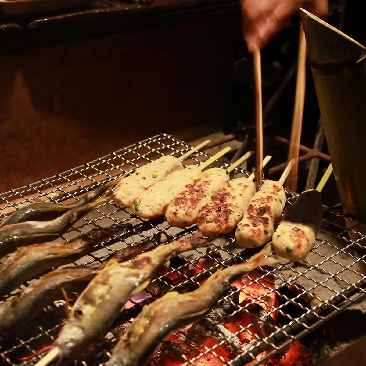 W02801 うわさの秘境めし ろばた焼き「アワビ・魚介類・野菜セット」1名様お食事券